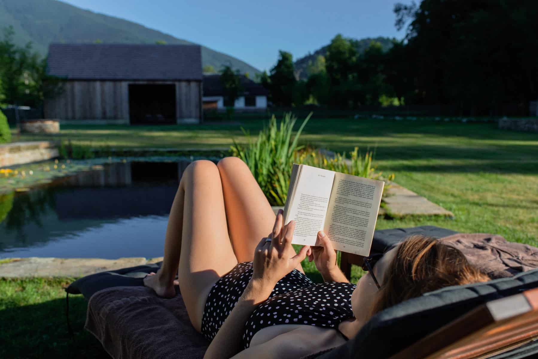 Woman reading good book on vacation